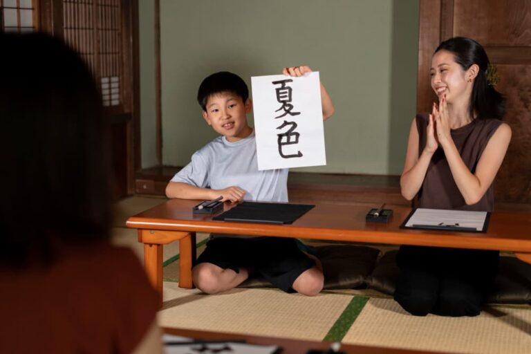 Close up on pupils doing japanese calligraphy, called shodo.